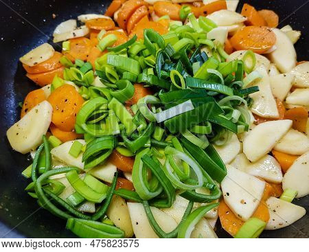Italian Pappadelle Pasta With A Roasted Salmon Steak And Vegetables