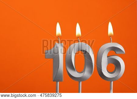 Candle Number 106 - Birthday In Orange Background