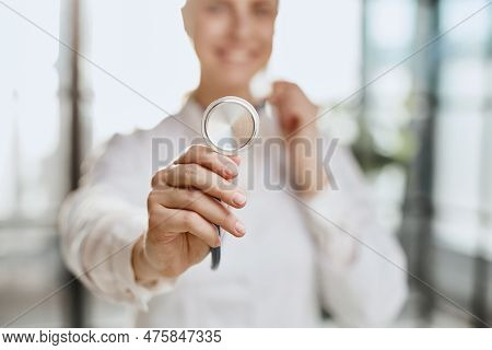 Female Physician Healthcare Professional Showing Medical Equipme