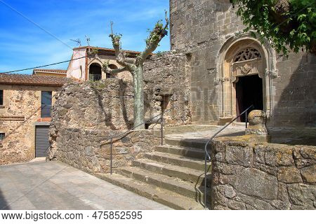 The Photo Shows The Entrance To The Ancient Church Of St. Peter In The Spanish Village Of Pubol.