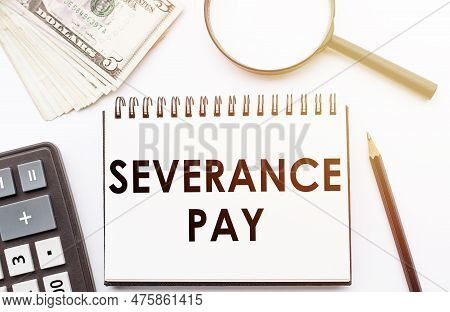 Paper With Severance Pay On A Table. Business Concept