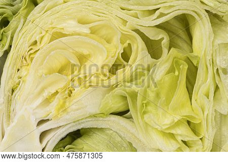 Full Frame Intersection Shot Of Green Fresh Iceberg Lettuce.