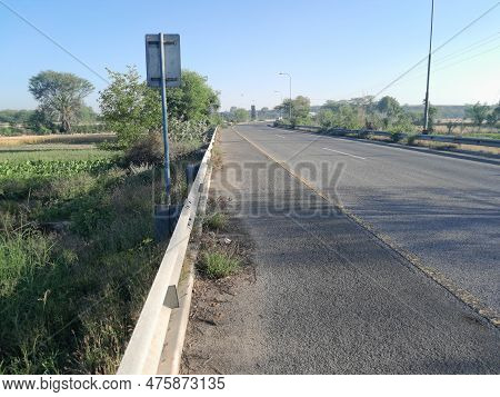 Road Closeup Located In A Moterway Side
