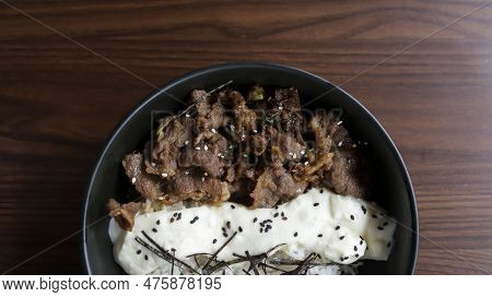 Gyu Cheese Don Consist Of Juicy Beef, Sautéed And Served Over Rice With A Savory, Creamy Cheese Sauc