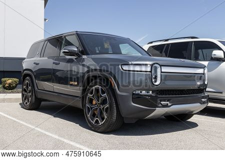 Indianapolis - Circa April 2023: Rivian R1s Ev Electric Vehicle Display At A Dealership. Rivian Offe