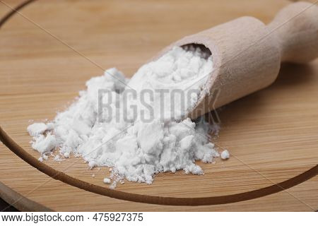 Wooden Scoop With Starch On Board, Closeup