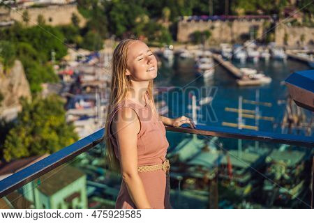 Woman Tourist In Old Town Kaleici In Antalya. Turkiye. Panoramic View Of Antalya Old Town Port, Taur