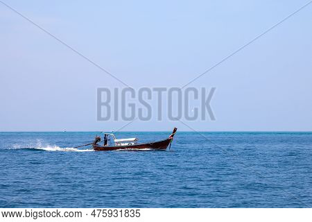 Old Traditional Thai Motorboat Made Of Wood For Fishing And Transporting Tourists On Excursions In T