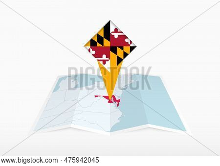 Maryland Is Depicted On A Folded Paper Map And Pinned Location Marker With Flag Of Maryland. Folded 