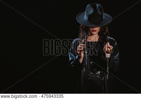 Dominant Woman With A Leather Whip Flogger And Handcuffs For Bdsm Sex With Submission And Domination