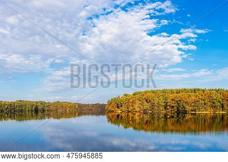 View Over The Lake Schmaler Luzin To A Landscape In Autumn Near Feldberg, Germany.