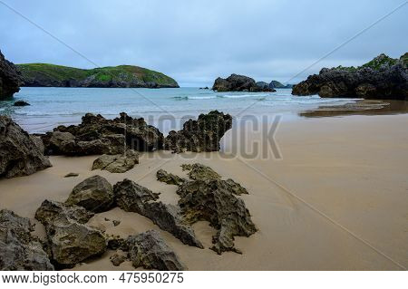View On Playa De Borizo In Celorio, Green Coast Of Asturias, North Spain With Sandy Beaches, Cliffs,
