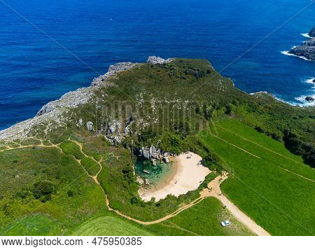 Aerial View, Playa De Gulpiyuri, Flooded Sinkhole With Inland Beach Near Llanes, In Asturias Norther