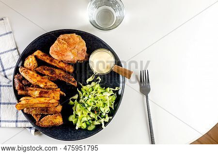 Fried Chiken Meat With Baked Potatoes In Spices And Salad On Plate For Tasty Lunch. Baked Chiken Wit