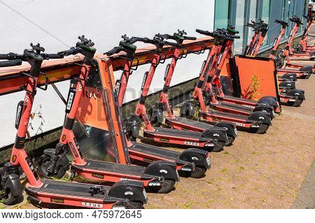 Oxford, Uk - June 11, 2022: Shared Electric Scooters For Rent By The Voi Company In A Street In Oxfo
