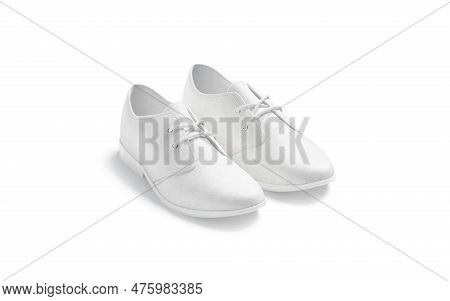 A Pair Of White Shoes With White Laces For A Festive Wedding Outing