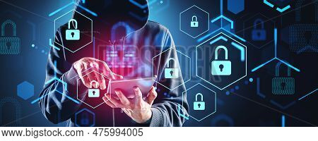 Hooded Man Hacker Finger Touch Tablet In Hand, Double Exposure Glowing Lock Circuit Connection. Conc