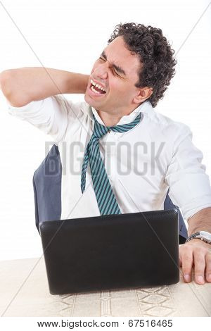Desperate Caucasian Business Man Frustrated With Work Sitting In Front Of A Laptop With His Hand On