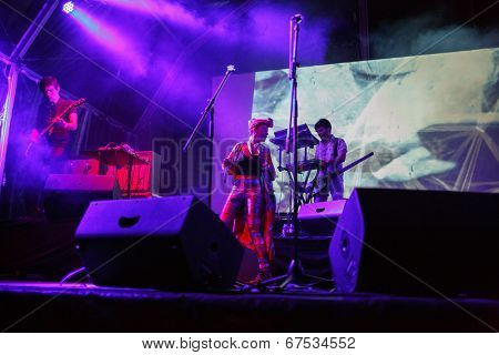 LOULE - JUNE 26: Bomba Estereo an eletronic dance music band from Colombia, performs on stage at festival med, a world music festival, in Loule, Portugal, June 26, 2014  