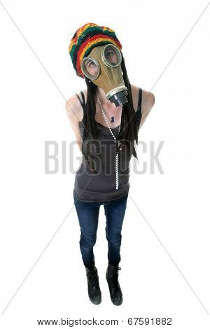 a girl in a gas mask wears her favorite Rastafarian style hat with built in Dred locks. isolated on white with room for your text.