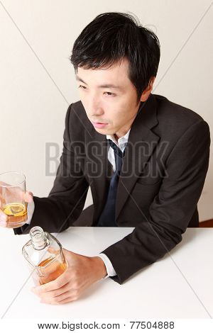 Alcoholis