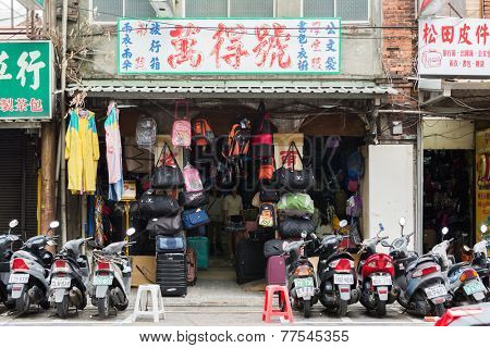 TAIPEI, TAIWAN - November 16th : A Shop sell various bags near Longshan Temple, Taipei, Taiwan on November 16th, 2014.
