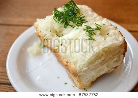 Traditional bread pampushki with parsley and garlic