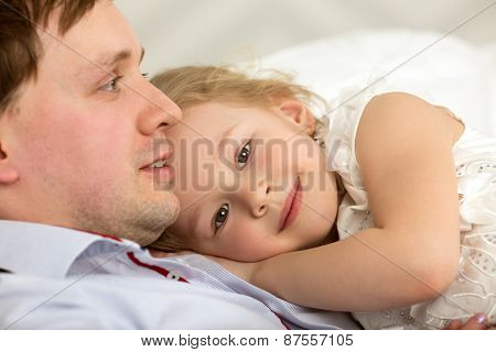 Lovely girl close to beloved father