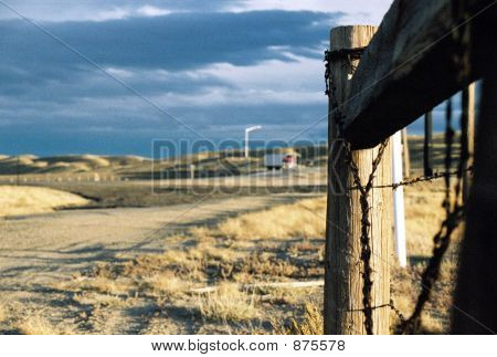 Fence On The Prairie In Wyoming In The Summer