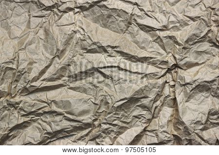 Close-up Of Rough Brown Wrinkled Packaging Paper Texture Background