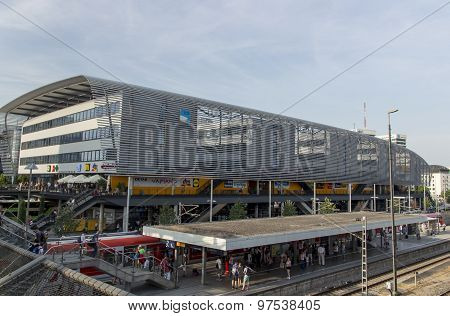 MUNICH, GERMANY - JULY 3, 2015: View from the Hackerbrueck on the station platform where trains arrive and depart in the background is the building of the central bus station in Munich
