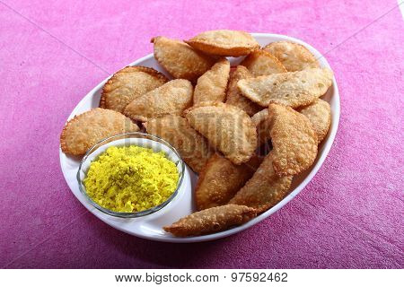 Gujia In Plate With Holi Color In Bowl