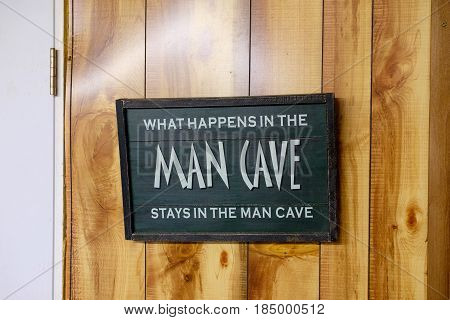 Man Cave sign says that what happens in the mancave stays there.