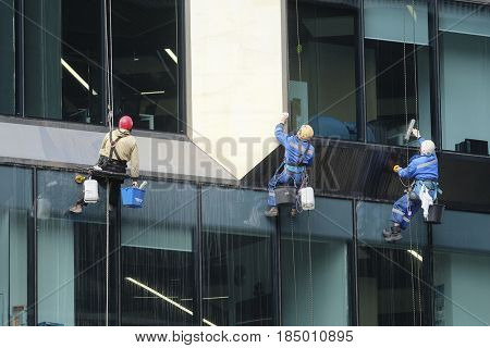 Moscow, Russia - May, 5, 2017: steeplejacks work in a center of Moscow