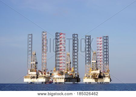 Labuan,Malaysia-May 1,2017:View of Jackup Rigs in Labuan island,Malaysia.Jackup rig is a floating barge fitted with long support legs that can be raised or lowered.