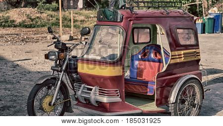 In Asia Philipphines The Typical  Motorbike