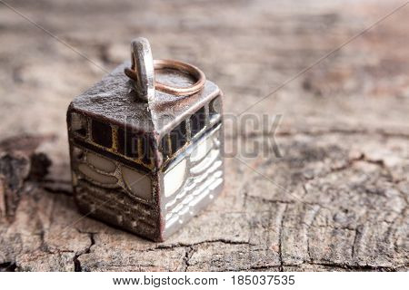 Miniature of Kaabah on a tree bark background