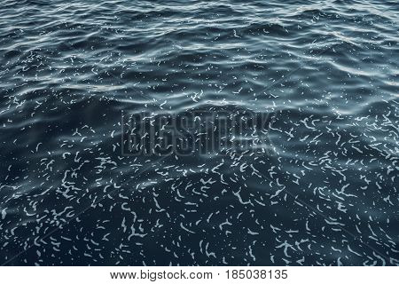 Sea Surface Aerial View. Background Shot Of Clear Sea Water Surface. Blue Sea Water In Calm. Sea Tex