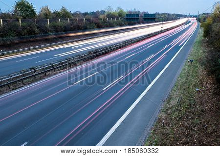 Highway at night with blurred car lights in a long exposure shot