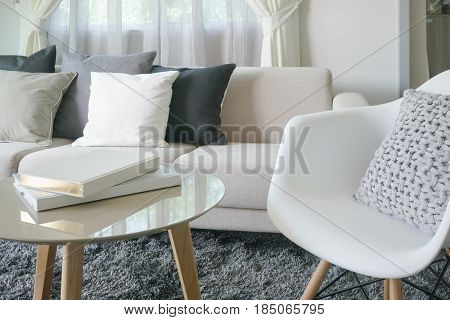 Armchair And Sofa With Pillows In Modern Style Interior Living Room