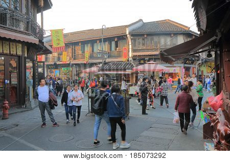 HANGZHOU CHINA - NOVEMBER 4, 2016: Unidentified people visit Qing He Fang historical street. is a protected area of the historical buildings from the Ming and Qing dynasty.