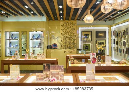 SINGAPORE - CIRCA SEPTEMBER, 2016: Risis jewellery store at Singapore Changi Airport. Changi Airport is one of the largest transportation hubs in Southeast Asia.