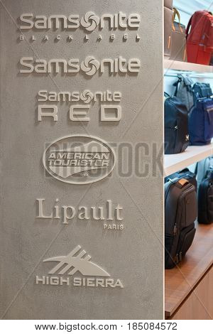 SINGAPORE - CIRCA SEPTEMBER, 2016: close up shot of Samsonite, American Tourister, Lipault and High Sierra signs at a store in Singapore Changi Airport. 
