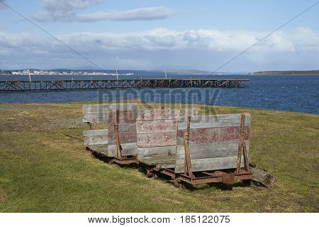 PUERTO NATALES, CHILE - APRIL 10, 2017: Historic railway cart at a former meat refrigeration plant that have been renovated and converted into a luxury hotel.