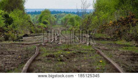 a bent train track on a bog in Ireland