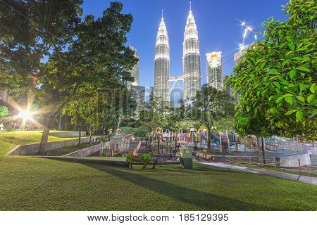 KUALA LUMPUR, MALAYSIA - AUGUST 13: Petronas Twin Towers in blue hour on August 13, 2016 in Kuala Lumpur. Petronas Twin Towers were the tallest buildings (452 m) in the world from 1998 to 2004
