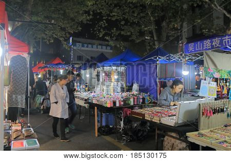 HANGZHOU CHINA - NOVEMBER 4, 2016: Unidentified people visit Wushan night street market.