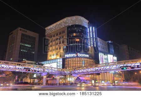 HANGZHOU CHINA - NOVEMBER 4, 2016: Unidentified people visit Yan an Road shopping street. Yan an Road is a main commercial district in Hangzhou.