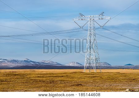 powerful electric power pylon closeup on tibetan plateau