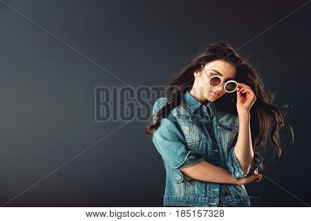 Gorgeous Girl With Red Lipstick And White Sunglasses Dressed In A Blue Jacket Red High Heel Shoes An